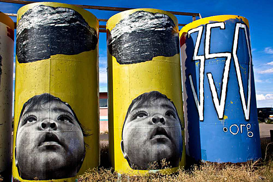 Fig. 9. Jetsonorama, Image created in 2011 for 350.org. Wheatpasted here in Gray Mountain, Arizona. Photo courtesy the artist.